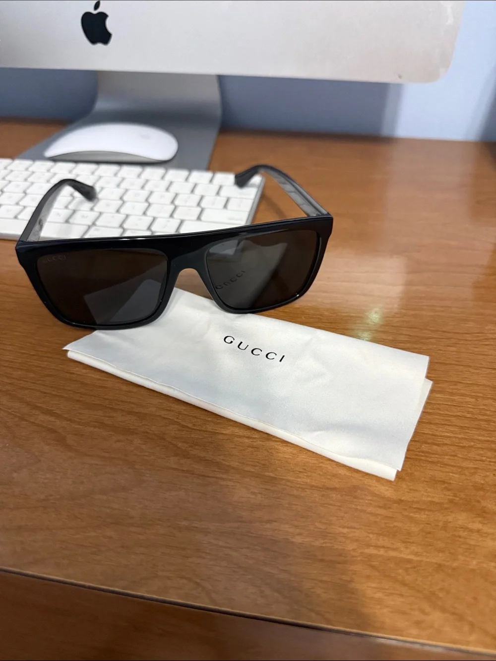 Gucci Black Sunglasses with Gold Plaque